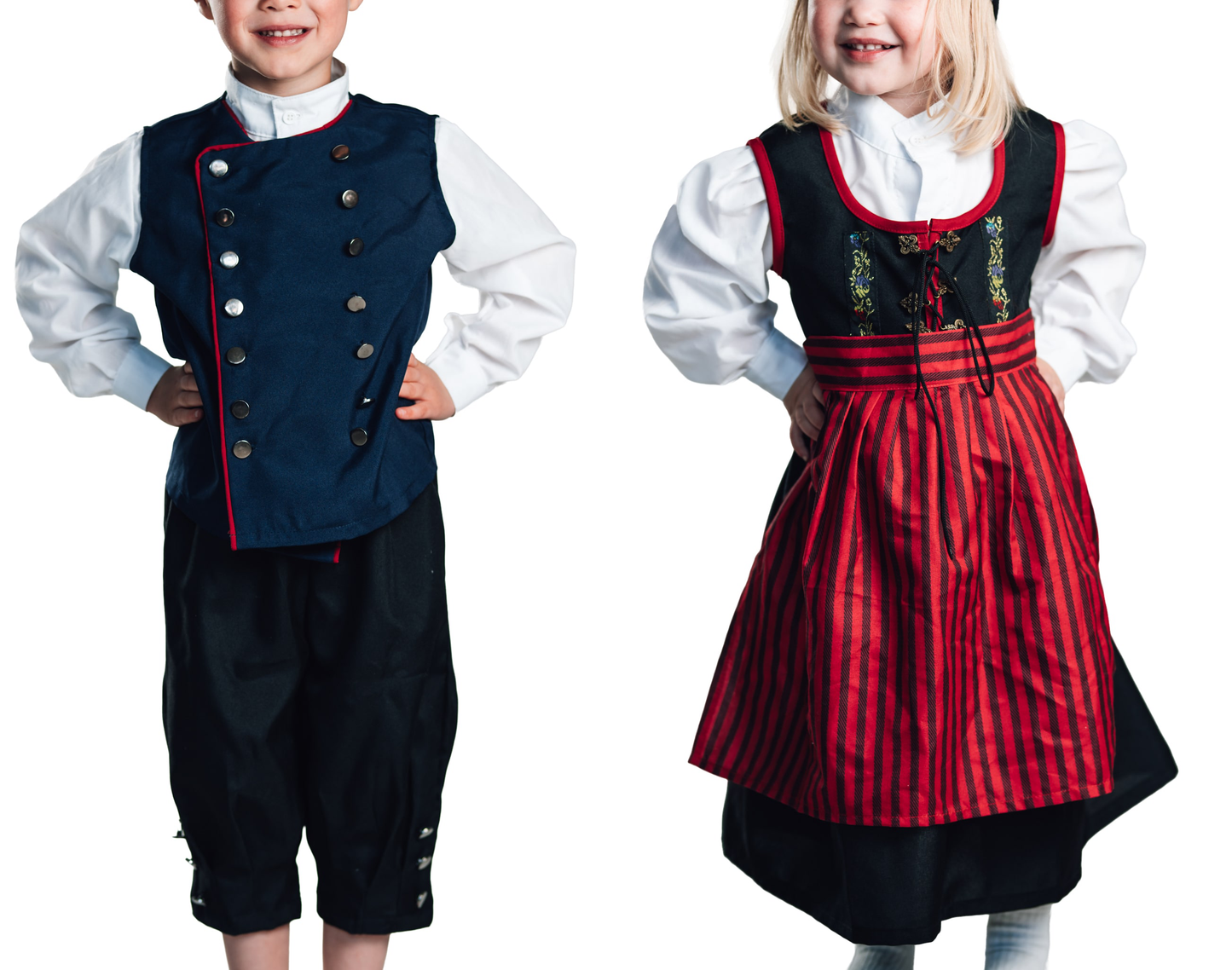 Lítill drengur í fallegum barnabúningi fyrir tyllidaga og stúlka í hátíðarbúning fyrir 17.júní